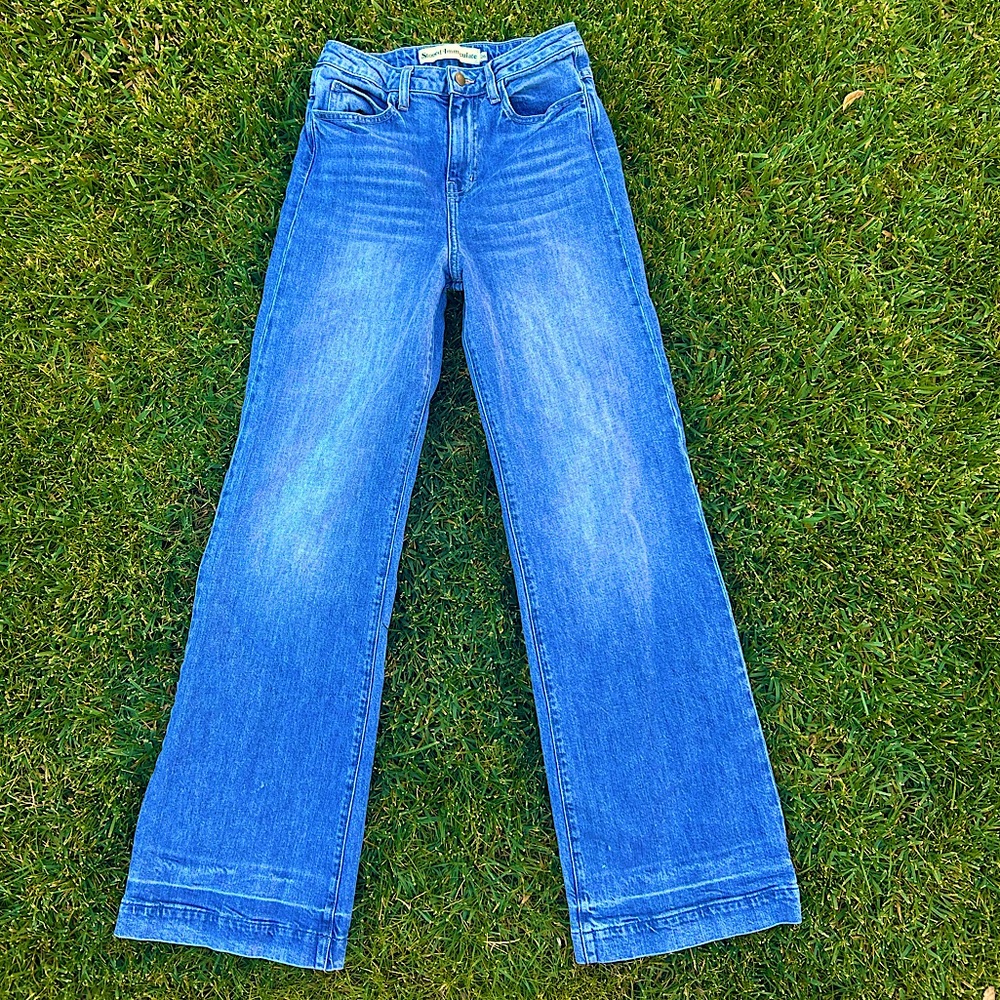 NWOT. Stoned Immaculate bell bottom jeans.
High waist, mushroom on back. Cute!